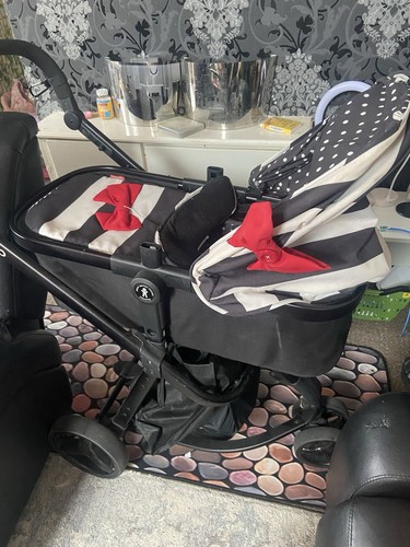 Two baby cosatto pram - in,